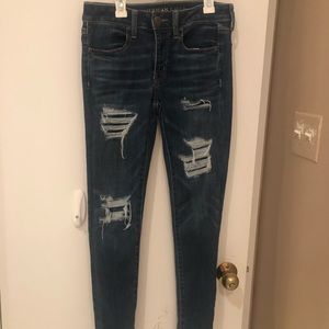 American Eagle size 6 dark blue ripped jeans